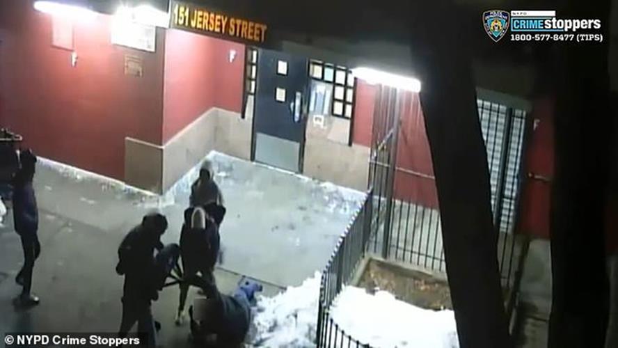 a group of people in a room: The robbery on Staten Island, New York happened at around 6.15pm February 10