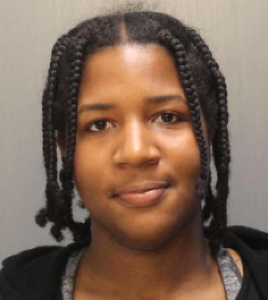 a person posing for the camera: Upper Darby Police Tylydiah Garnett