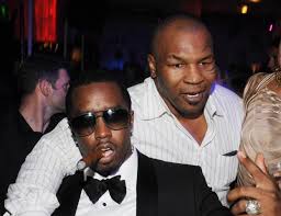 Mike Tyson Moves Diddy's Hand Away From His Butt In Resurfaced Clip, 50 Cent Jokes