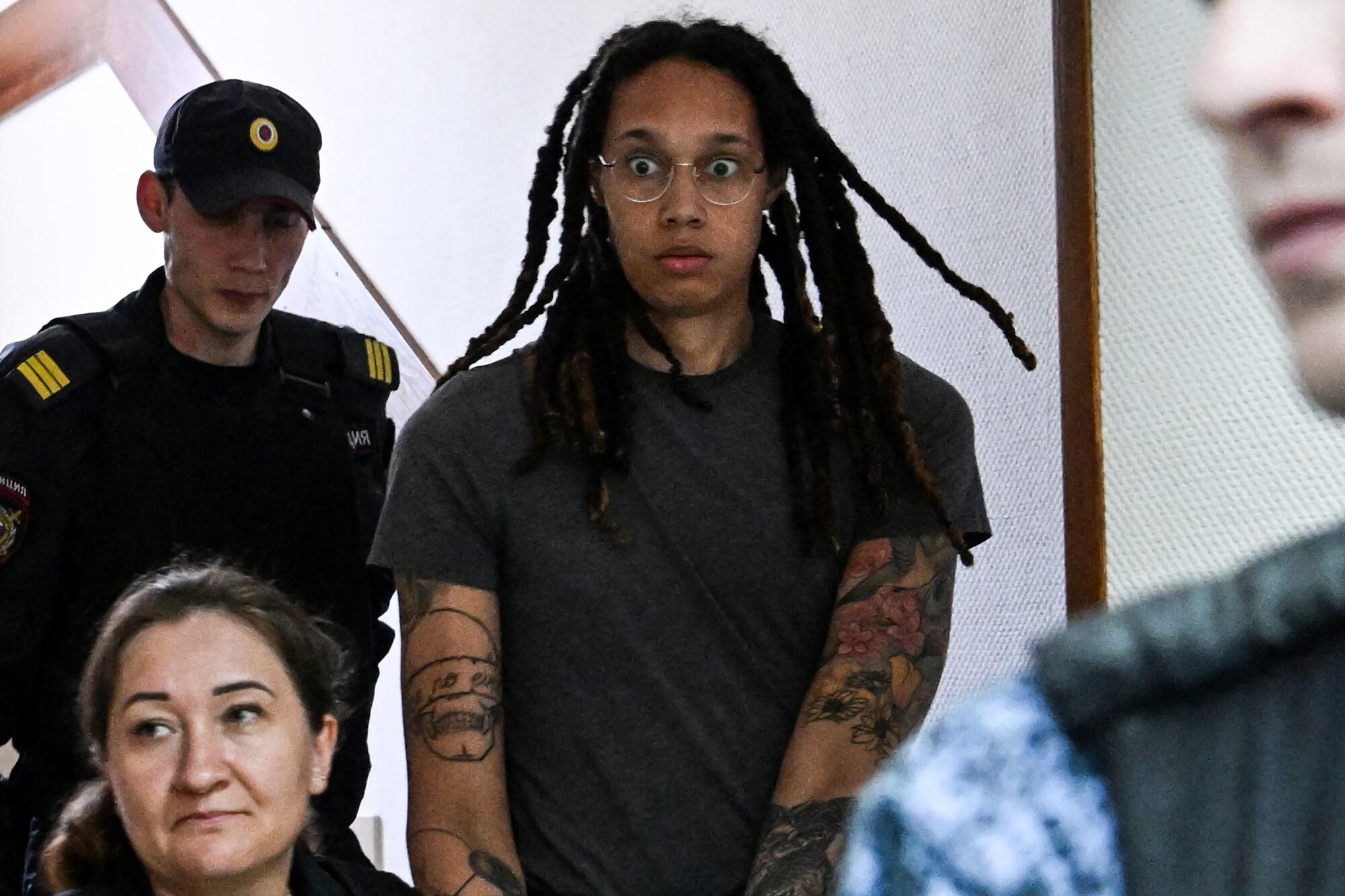 First photos of WNBA's Brittney Griner appearing in a Russian court - Los Angeles Times