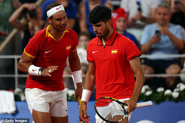 Earlier in the week, Alcaraz had teamed up with Rafael Nadal (left) in the men's doubles event